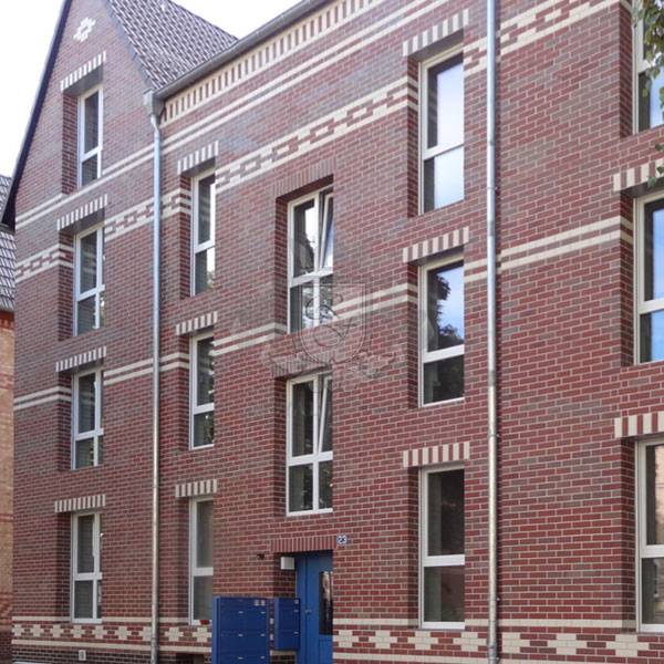 Фото приклад енергоефективного утеплення фасаду будівлі